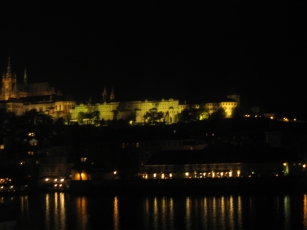 Prague Castle lit up at night, from Charles Bridge
