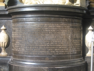 Engraving around the base of the statue