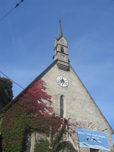 A smaller church with ivy